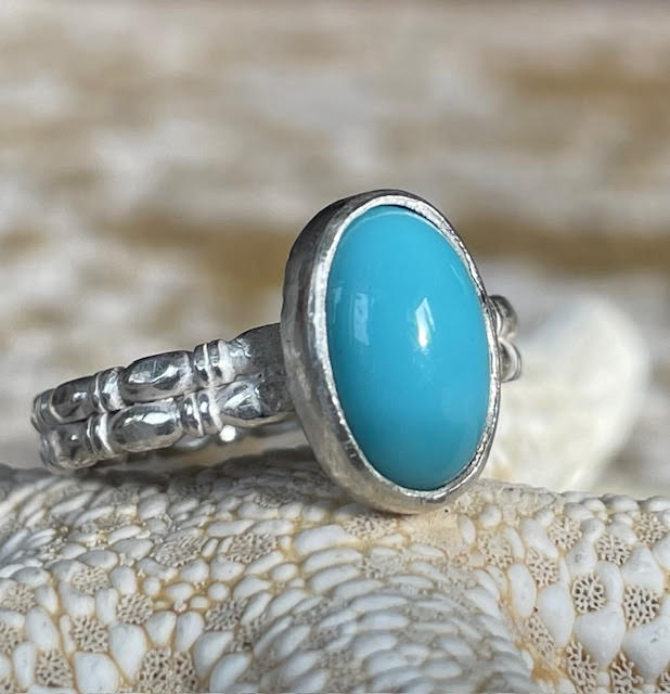 Zilveren ring met dubbele band en ovale turquoise